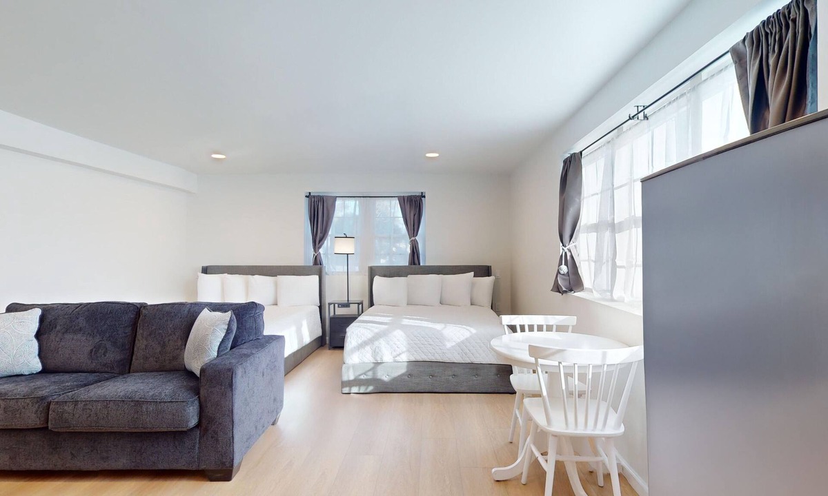 Lower Township Hotel | Comfortable Coastal Retreat with Two Queen Beds & Sleeper Sofa - Suite Room