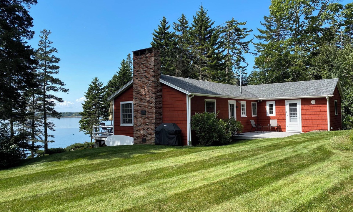 Pleasant Point House | Cozy waterfront cottage overlooking Muscongus Bay with stunning sunset views.