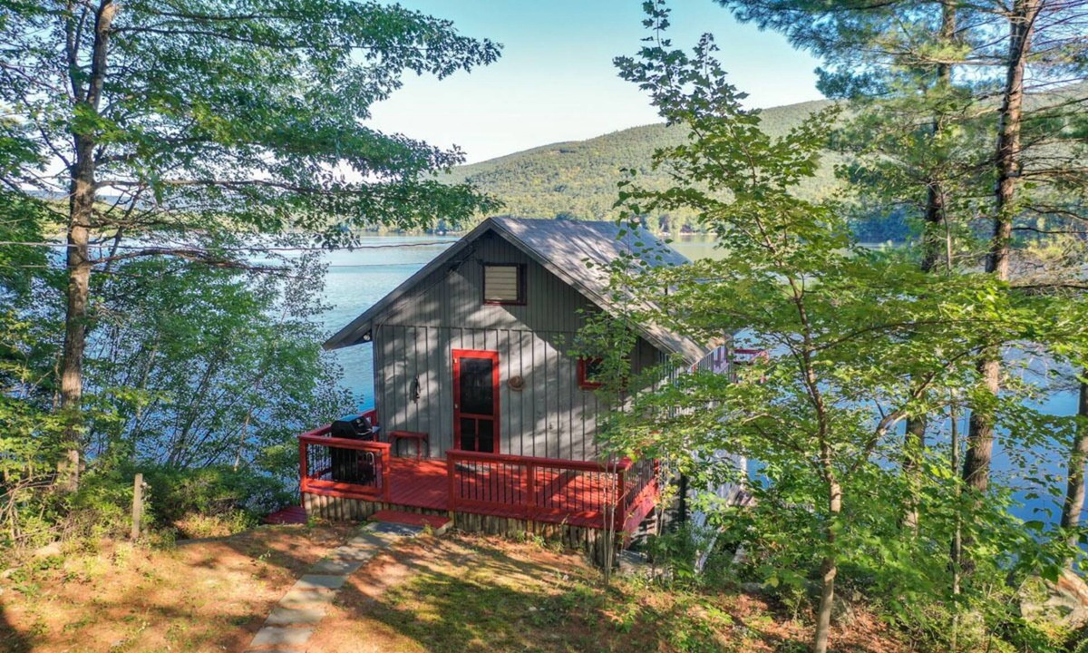 Moultonborough House | Darling studio over boathouse on Lake Kanasatka