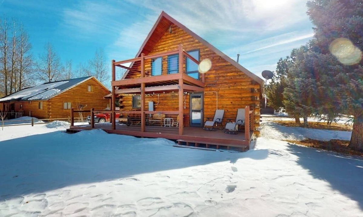 Rivers Edge House | Riverfront home with river & valley views, wood stove, deck, & W/D