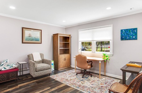 Edgewater House | 2-story, riverfront home with private dock, inviting deck & dog-friendly yard