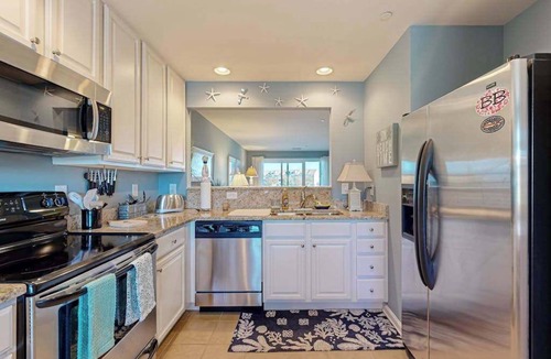 Ocean View Condo | Bethany Bay spacious condo w/shared pool, water view & golf course