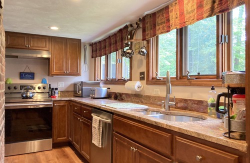 Lochmere Cottage | Big Pine Lakefront Cottage with Dock, Fire Pit & BBQ