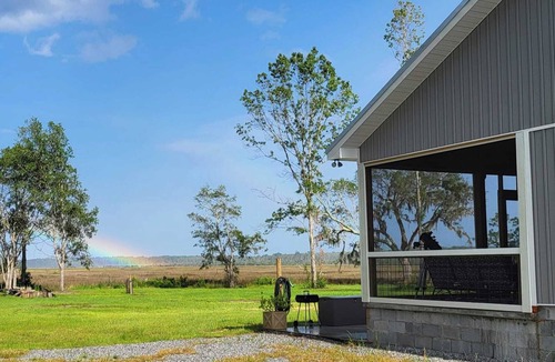 Eulonia Cottage | Charming coastal cabin overlooking the marsh, near Darien and Shellman Bluff GA.