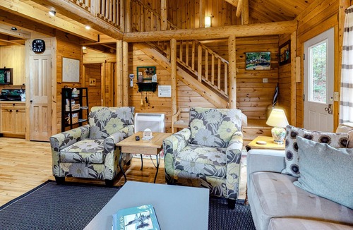 Boothbay Cabin | Charming, Lakefront Cabin with a Fireplace, Wood Stove, Kayaks, & Sandy Beach