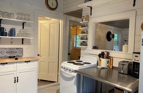 Readfield House | Charming, peaceful Maranacook waterfront camp nestled in the pines