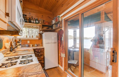 Laconia Cottage | Charming waterfront cottage at Weirs Beach with shared dock and WifI