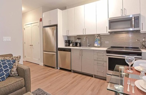 Central-Maverick Square - Paris Street Apartment | Clean + Modern Studio | Full Kitchen | Travel Nurse Friendly | by GLS