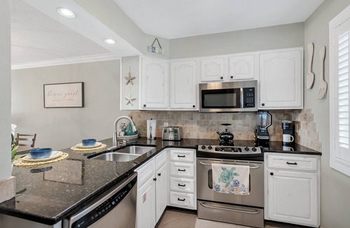Holiday Isle Condo | "Coastal Dream” – Fun, Views & Loaded Amenities!