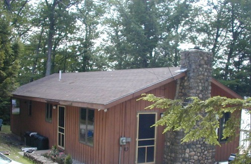 Harrison House | Cozy waterfront cottage on private land with beautiful sunsets over Long Lake
