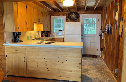 Pleasant Point House | Cozy waterfront cottage overlooking Muscongus Bay with stunning sunset views.