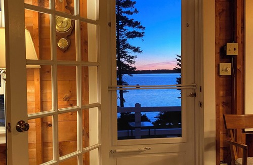 Pleasant Point House | Cozy waterfront cottage overlooking Muscongus Bay with stunning sunset views.