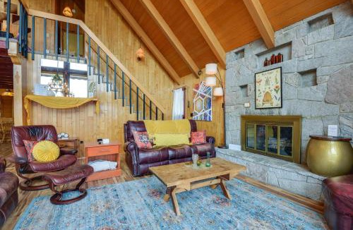 Vernon Apartment | Deck, Mountain Views: Colorful Retreat in Vernon!