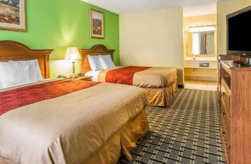 Douglas Hotel | Delight in Pet-Friendly Four Double Queen Bed Rooms w/Pool Outdoor Pool
