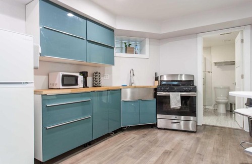 Lakeview Apartment | Double Play Wrigley - Prime Location Across from Wrigley Field & Transit - 2BR Apts