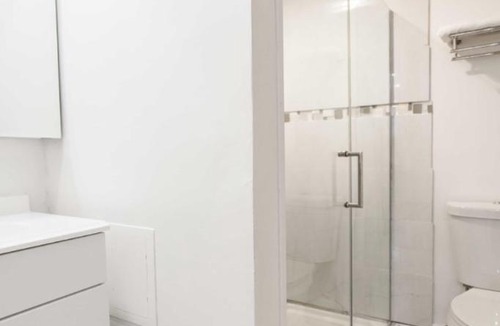 Lakeview Apartment | Double Play Wrigley - Prime Location Across from Wrigley Field & Transit - 2BR Apts