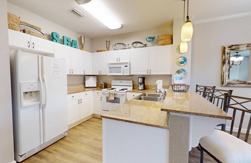 Frangista Beach Condo | Emerald Waters 101 - pristine Gulf rental, pool, short walk to beach