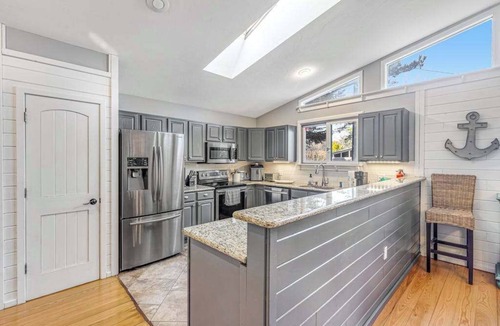 Rehoboth by the Sea House | Experience Classic Dewey Charm at This Coastal Retreat with Hot Tub