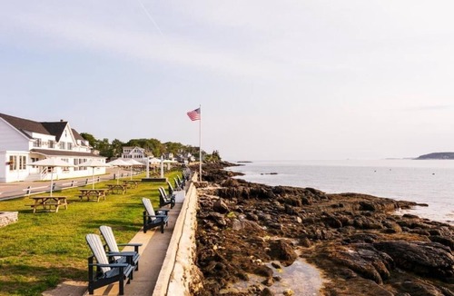 Ocean Point Hotel | Experience Serenity in Stylish Room with Terrace and Oceanfront Access
