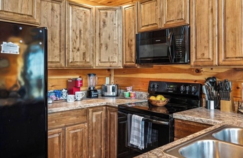Sevierville Cabin | Firefly Ridge! Pool, Fishing Pond, Hot Tub, Fire Pit!