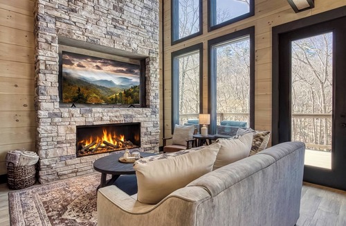 Gatlinburg - Pigeon Forge Ski Chalet | Header: Whiskey Splash | Indoor Pool · Hot Tub · 75-Ft Waterfall · Sleeps 10