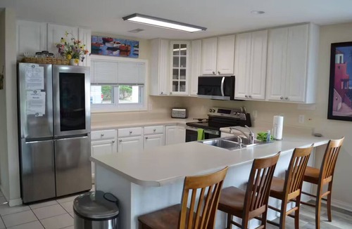 La Follette Condo | LAKEFRONT Deerfield condo on Norris FIRST ROW steps to covered boat slip & pool
