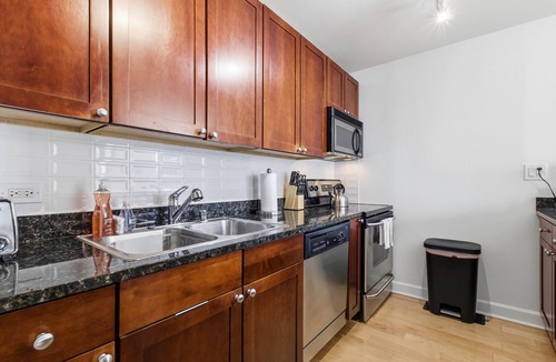 Near North Side Condo | NEW! 2bd River North Million Dollar Views! Parking Incl by AllSet Turnover