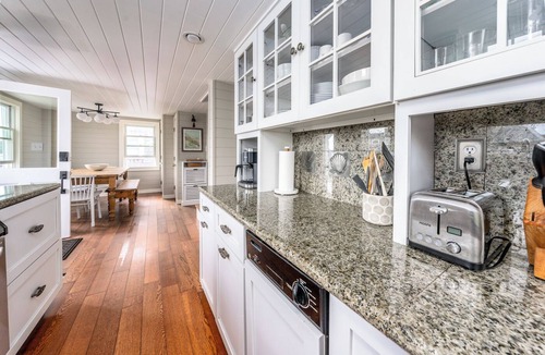 East Sandwich Cottage | Ocean front oasis with renovation nestled in the dune on a private beach.