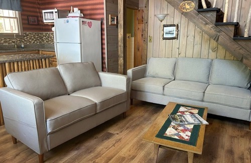 Rangeley Plantation Cabin | Peaceful, Secluded Waterfront Cottage with Sandy Beach