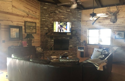 Hoyt Cabin | Private lakefront getaway with a sandy beach below the back deck!