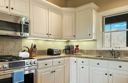 Pangburn House | Riverfront Bliss- Private River Dock & Two King rooms!