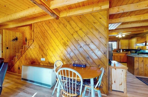 Rivers Edge House | Riverfront home with river & valley views, wood stove, deck, & W/D