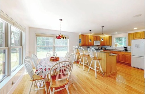 Ellsworth House | Secluded lakefront home with patio & firepit, fast WiFi, wood stove & W/D