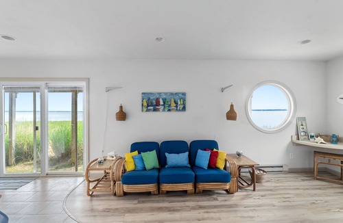 Southold House | Serene bay front home with a private beach, deck, board games, & washer/dryer