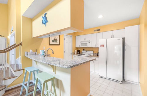 Bethany Beach Villa | Spacious Sea Colony second floor condo with pools, hot tubs & washer/dryer