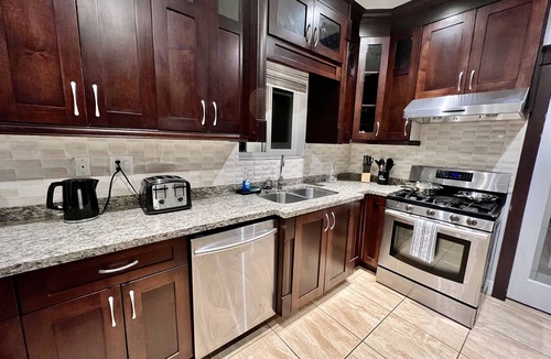 Vancouver South House | Spacious upper-level unit located on Main St.