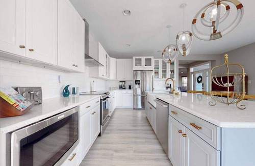 Frankford House | Tidal Walk home with pond views, outdoor pool, decks, fast WiFi, & bikes