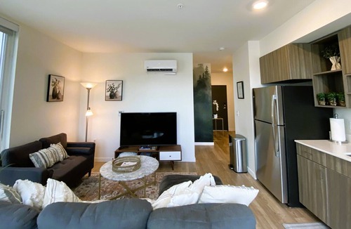 Riverside Apartment | Walk 2 Riverfront Park, Conv Center-Free Secured Parking! EV Charger