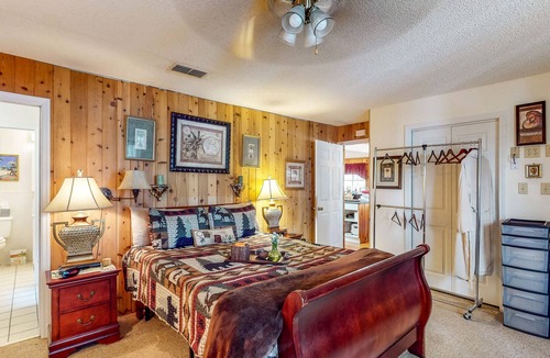 Fort Gaines House | Waterfront stay with boat launch, private beach, wrap-around deck, & grill