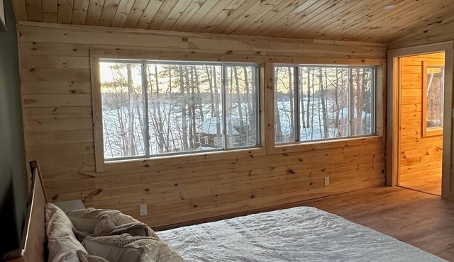 5 bed 4 bath in the Basin of Sebago Lake with 200 ft. of shared beach frontage