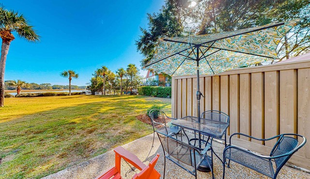 Charming Ground Floor studio condo near beach with tennis, pickleball, & water views