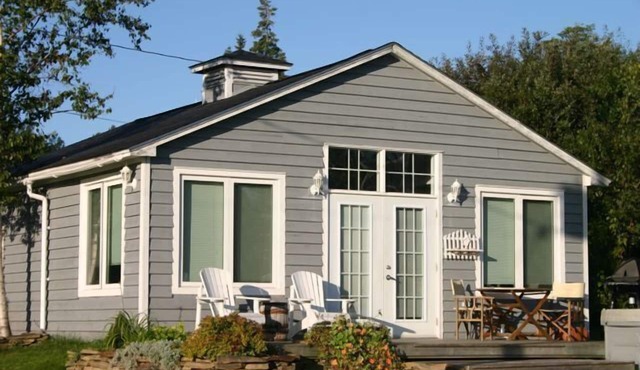 Charming Modern Cottage with water views and private Spa. Quiet Coastal Location