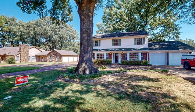 Conveniently located home with pool, yard, patio, grill, & washer/dryer