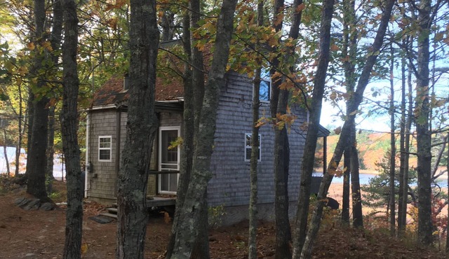 Cottage featuring a Screened Porch overlooking the Water
