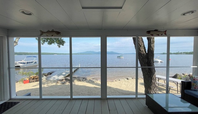 Cozy lakefront home on Ossipee Lake, w/beach, dock and amazing view.