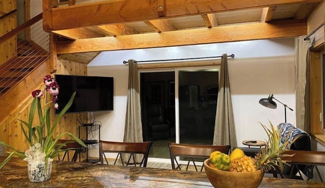 Custom cottage feels bright & airy yet cozy and private in this country setting.