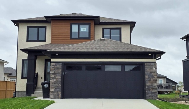 Enjoy this modern ENTIRE HOME in a welcoming and family-friendly neighbourhood!