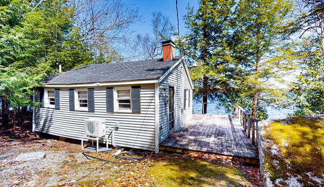 Lakefront cabin with deck, grill, screened porch, & firepit - dog-friendly
