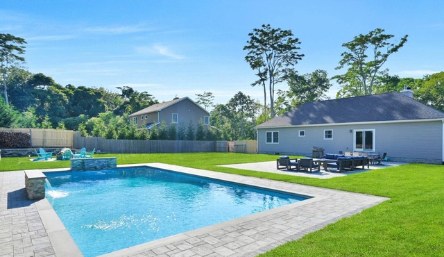 Newly built ranch, beautifully landscaped with pool, large yard, patio,.