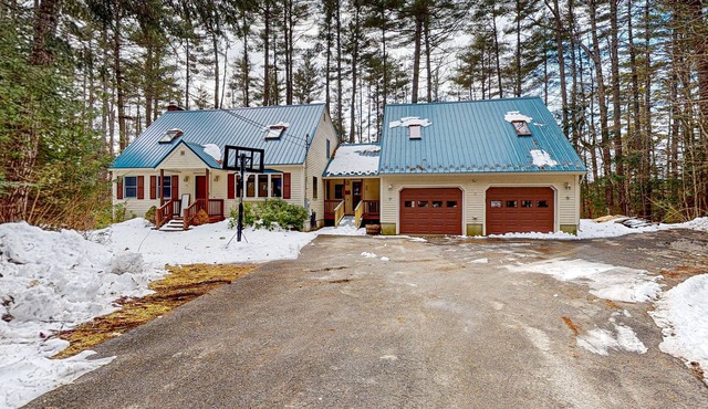 Peaceful lakefront retreat with private hot tub, game room, & deck - near skiing